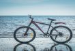 Ride A Mountain Bike On The Sea Beach.jpg