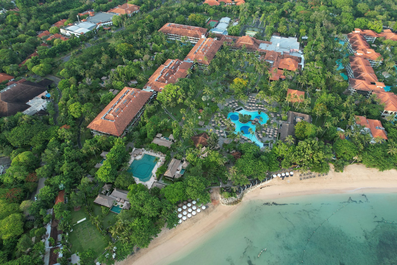 An aerial view of a beach and a resort