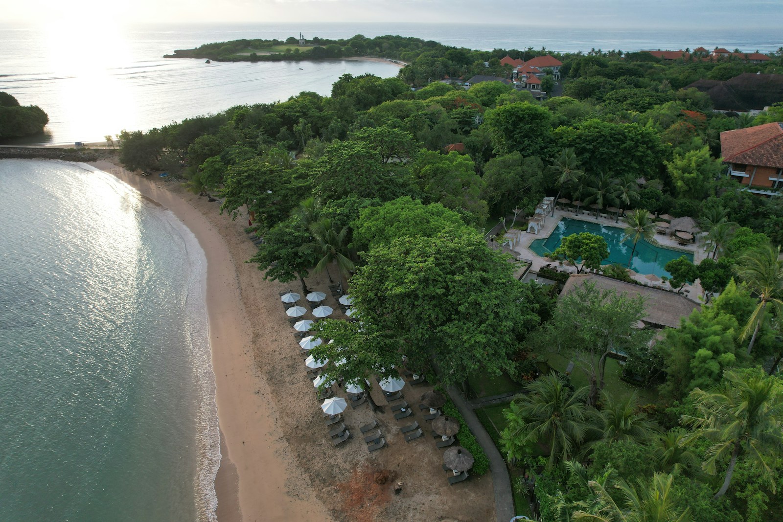 An aerial view of a beach and a resort