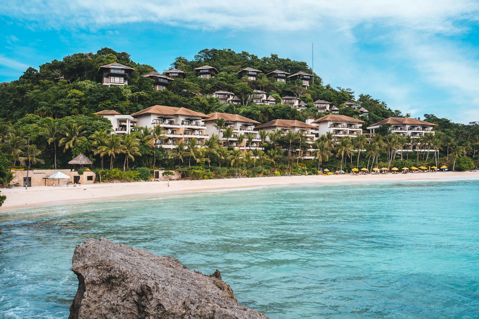 a beach with a large building on top of it